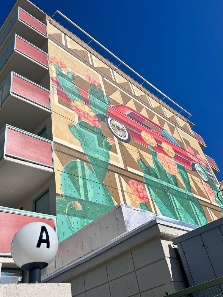 The low-rider mural on the outside of the Arrive Hotel.