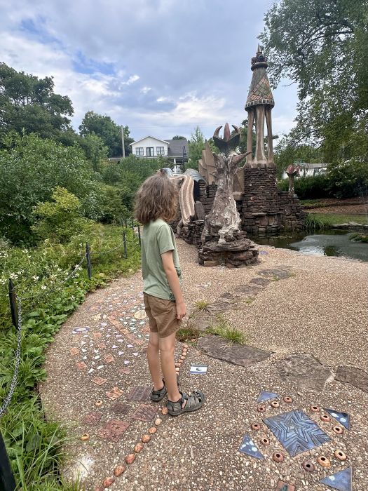 My grandson standing at the Wilson Park Castle.