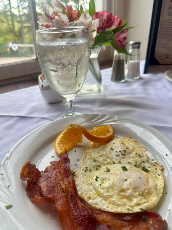Breakfast plate of eggs and bacon at the 1886 Crescent Hotel Eureka Springs.