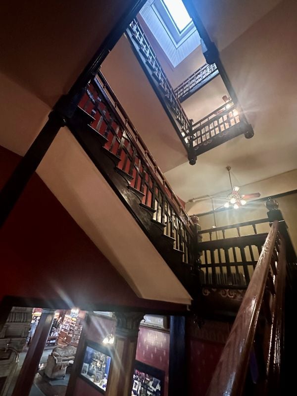 Looking up through the staircase from the first floor up three floors at the 1886 Crescent Hotel Eureka Springs.