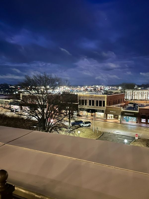 A view of downtwon Cleveland, Mississippi at dark from the rooftop of The Cotton House Hotel.