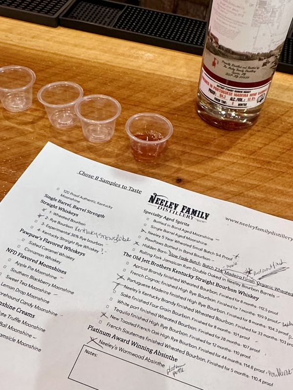 The list of spirits available for tasting, with my scribbles and notes, with tastings at Neeley Bourbon.