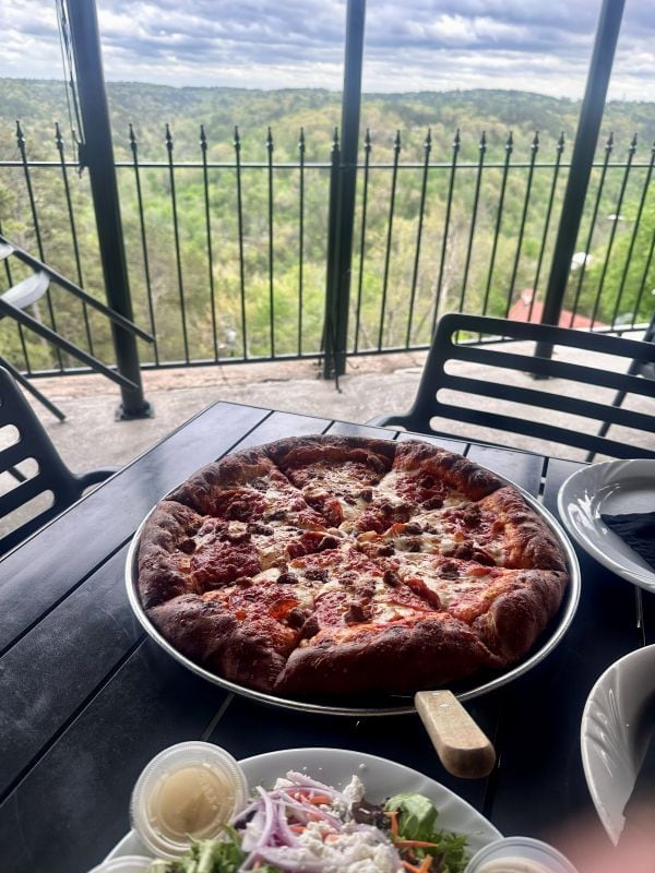 Pizza with a view of the Ozark Mountains at the 1886 Crescent Hotel Eureka Springs.