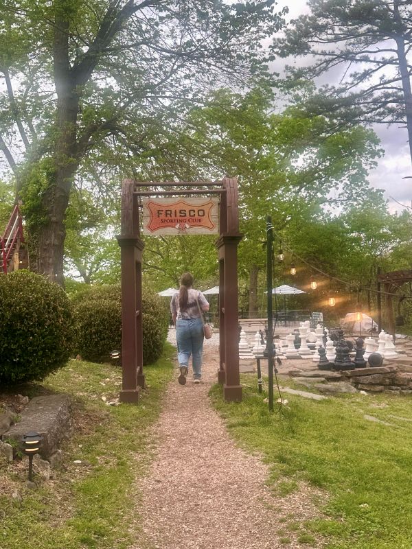 Walking the path to the Frisco Food Truck in the Frisco Sporting Club, the backyard of the 1886 Crescent Hotel Eureka Springs.