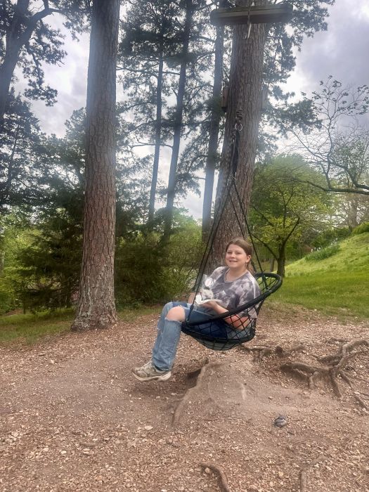 Enjoying the seat swings in the backyard of the 1886 Crescent Hotel Eureka Springs.