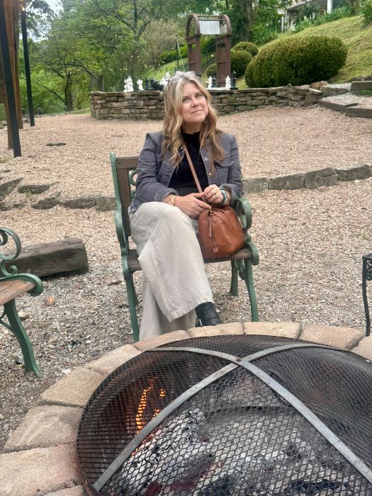 Me enjoying the wood fire pit in the backyard of the 1886 Crescent Hotel Eureka Springs.