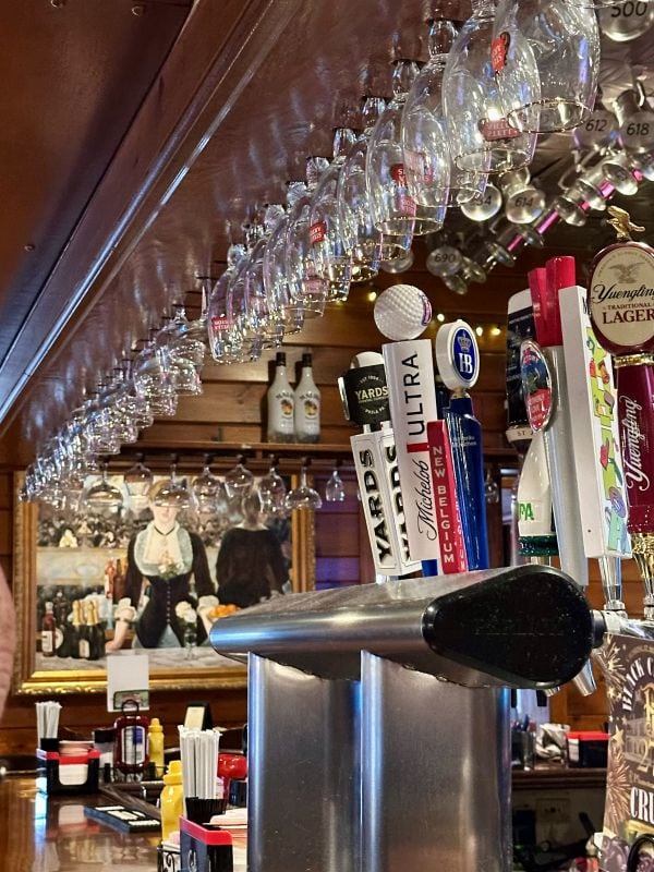 Beer tabs at the Plumbsteadville Tavern, one of the oldest taverns in Bucks County, Philadelphia off the beaten path.