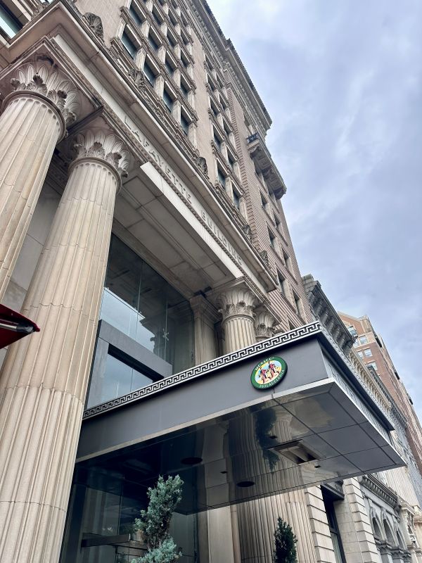The historic exterior of the Kimpton Monaco Philadelphia, a hotel near Independence Hall.