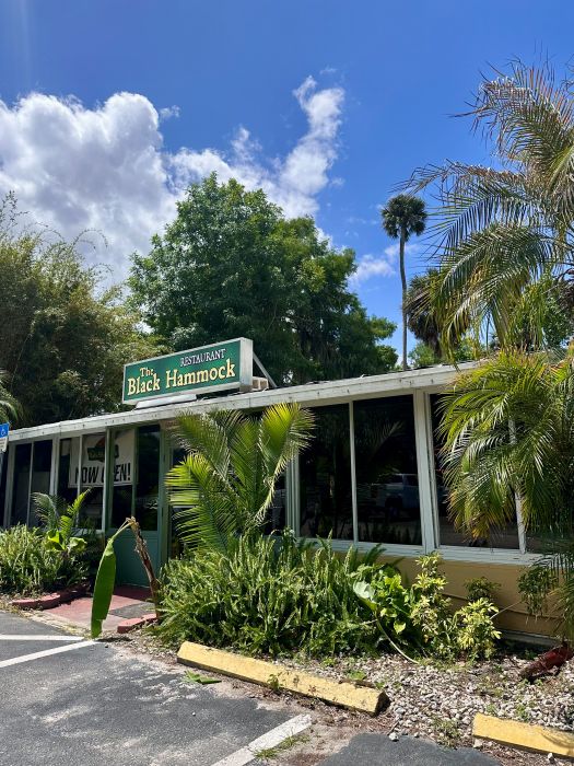 The exterior of The Black Hammock Restaurant part of the Lazy Gator Bar.