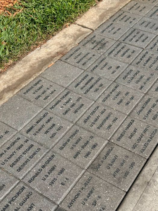 Names of veterans on bricks in Veterans Memorial Park in Sanford Florida.