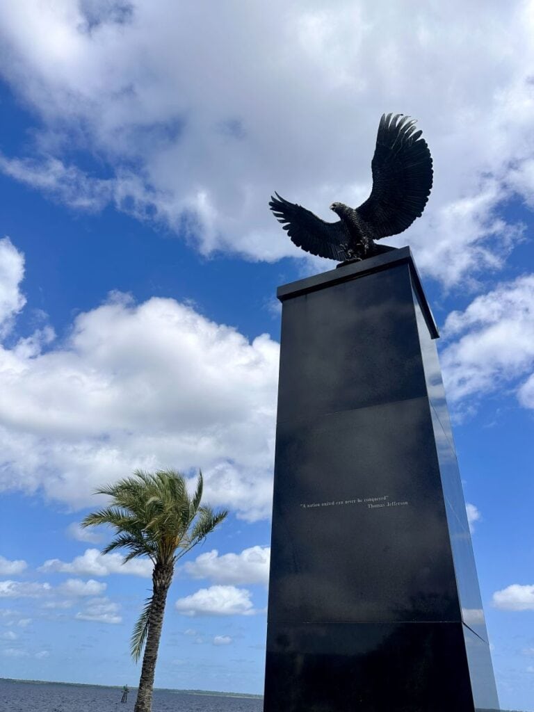 A view looking up at the tall eagle bronze statue in Vtereans Memorial Park in Sanford Florida.