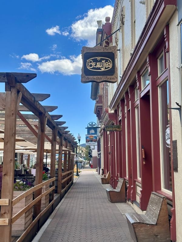 A view of downtown Idaho Springs and Beau Jo's Pizza sign on my Colordo mountain retreat.