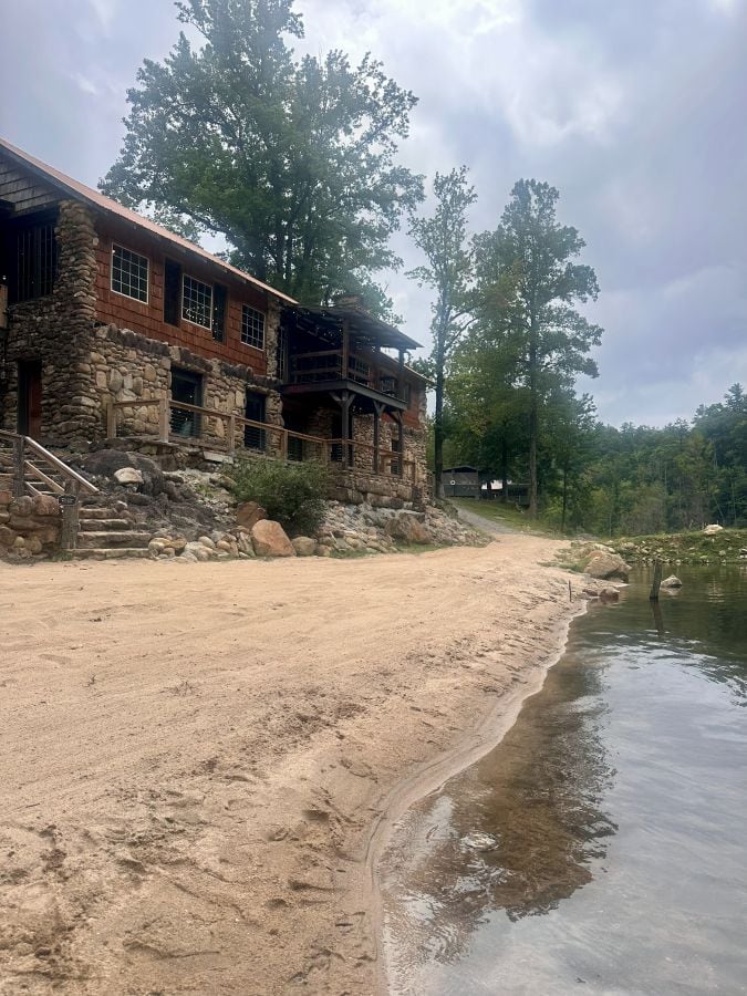 Looking behind me to the pavilion from the water in the swimming hole at Brown Mountain Beach Resort.