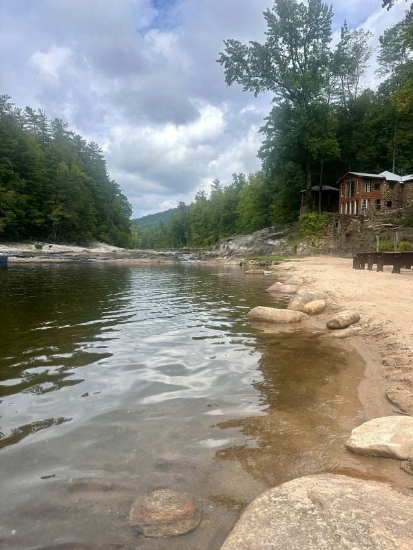My view while at the edge of the water in the swimming hole at Brown Mountain Beach Resort.