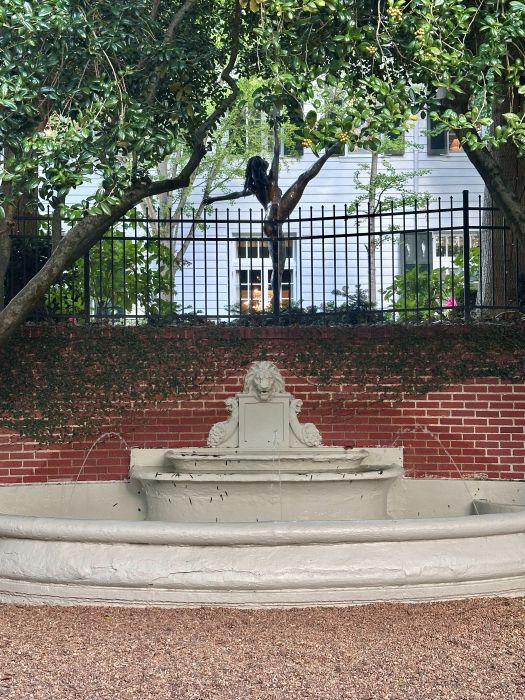 A full view of the original lion fountain, installed by Duke at the Duke Mansion, one of the historic hotels in Charlotte.