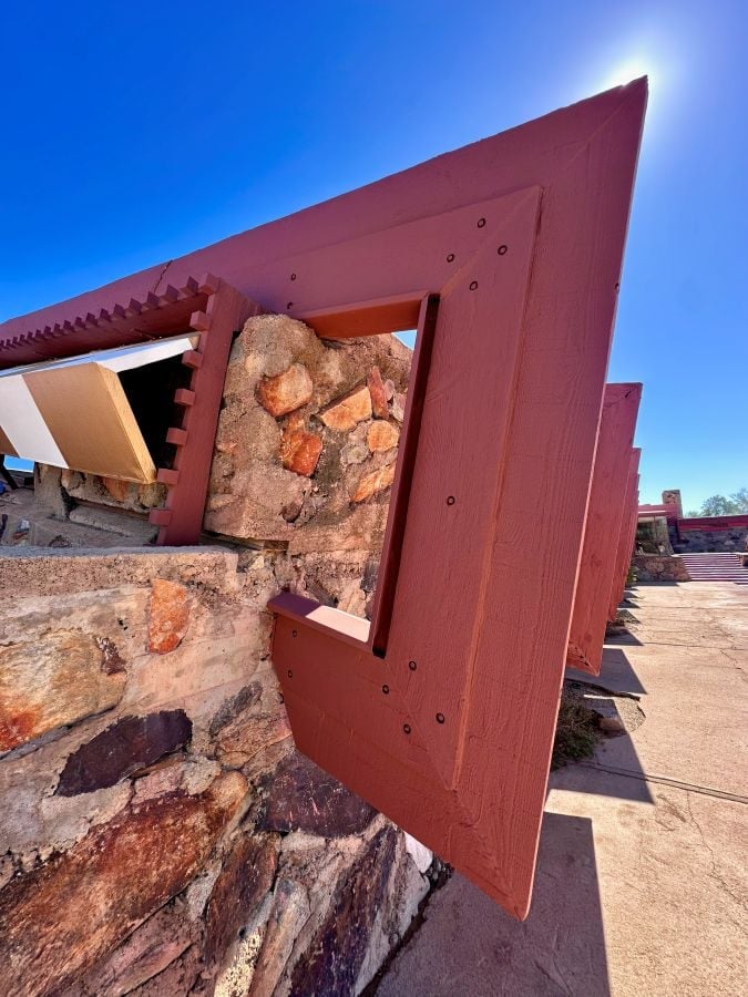 Modern geometric structure with stone wall at Taliesen West, a Frank Lloyd Wright House in Scottsdale, Arizona.
