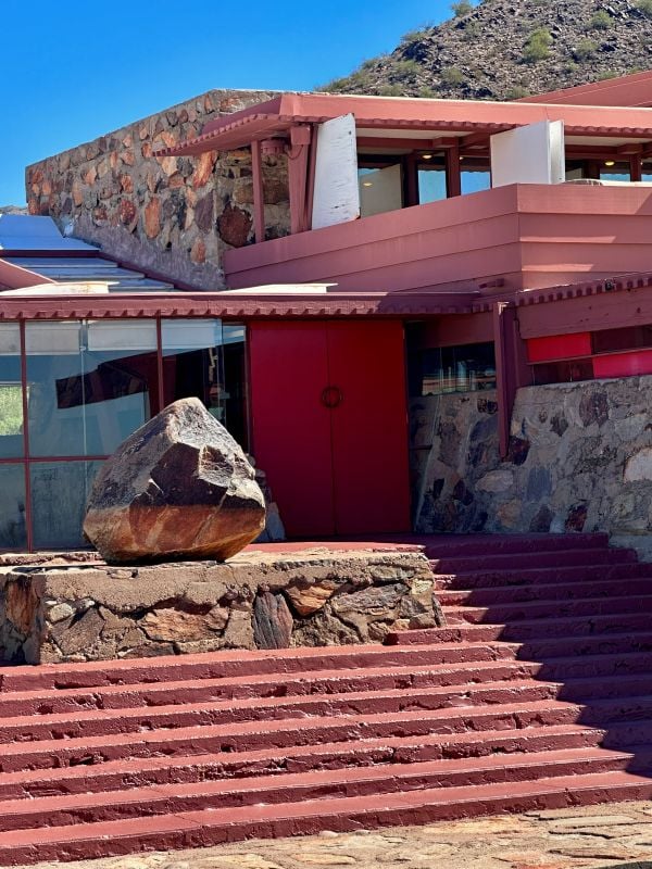 Contemporary home with stone and pink accents, Taliesen West, a Frank Lloyd Wright home in Scottsdale, Arizona.